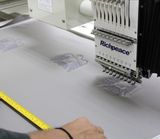 Brand Logo Embroidery on suede fabric & leather